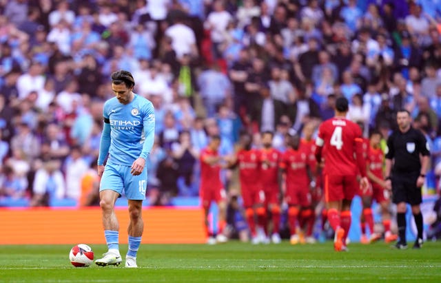 Jack Grealish looks dejected after FA Cup semi-final defeat