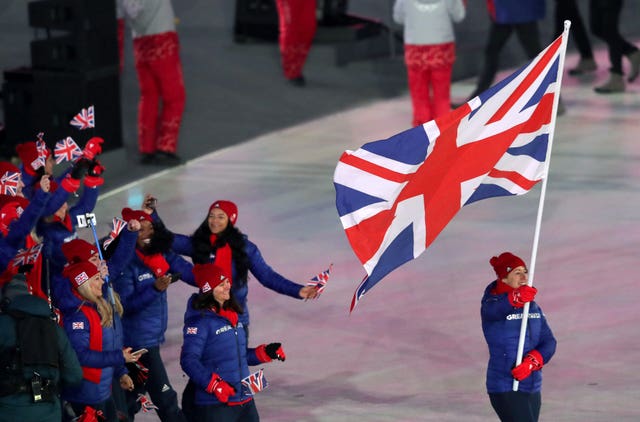 Flag-bearer Lizzy Yarnold leads Team GB 