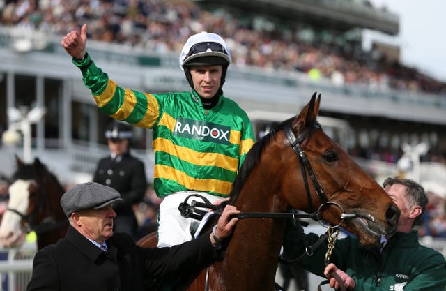 Fakir D'oudairies and jockey Mark Walsh after winning at Aintree