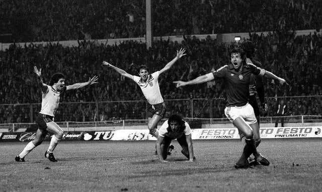 Mariner, on his knees, after scoring the goal against Hungary that took England to the 1982 World Cup