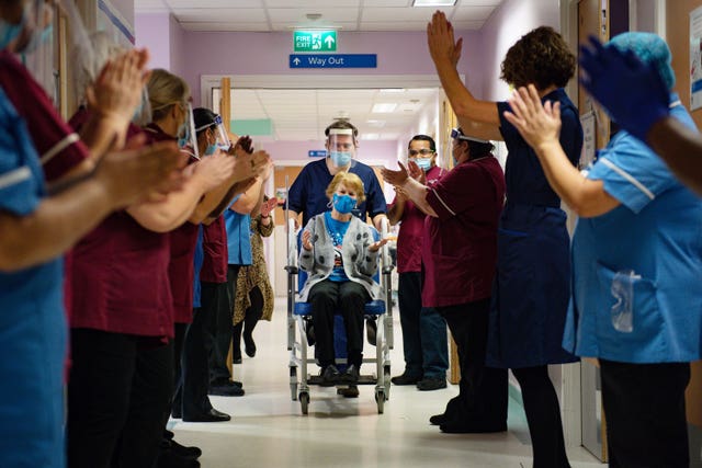 Margaret Keenan, 90, being applauded after receiving her Covid-19 vaccine