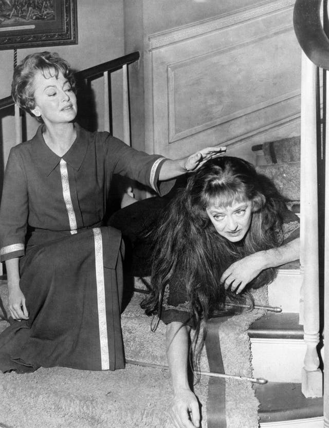 Olivia de Havilland (left) and Bette Davis in a scene from their film Hush… Hush, Sweet Charlotte 