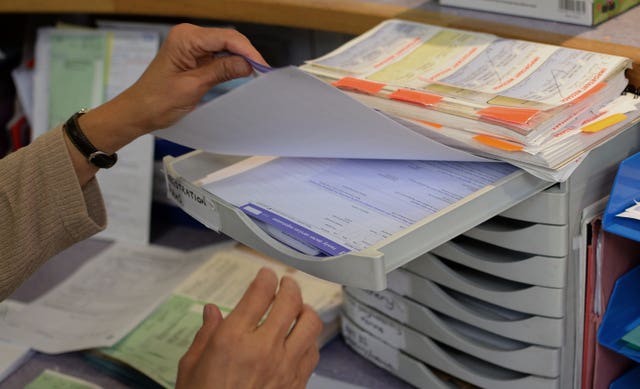A receptionist at a GP practice