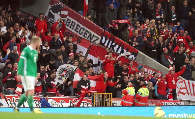 Austria fans celebrate their side's opening goal (Brian Lawless/PA).