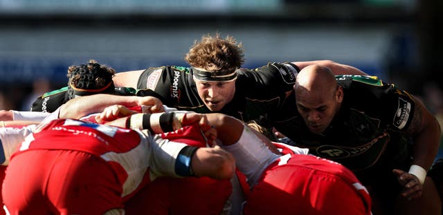 Hartley prepares to pack down against the Gloucester scrum when playing for long-term club Northampton Saints