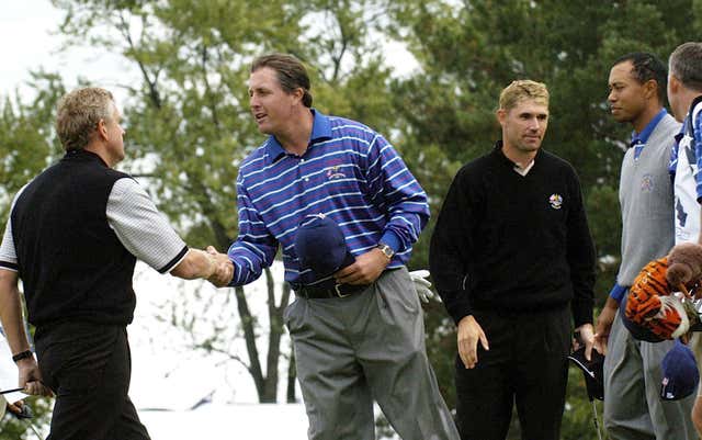 Phil Mickelson (centre left) and Tiger Woods (second right) proved an unsuccessful pairing in 2004 (Rebecca Naden/PA).