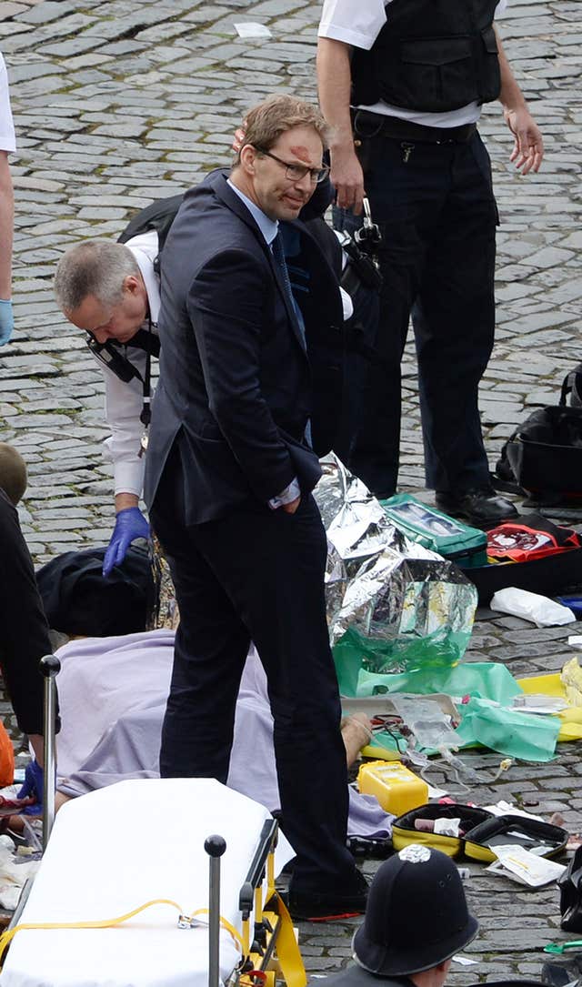 Tobias Ellwood in the aftermath of the Westminster attack (Stefan Rousseau/PA)