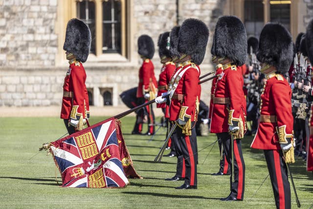 The new regimental colours of the 1st battalion Irish Guards are paraded in the Quadrangle of Windsor Castle after they were presented to the regiment by the Duke of Cambridge