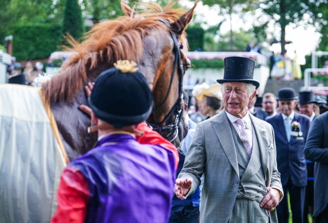 The King with Desert Hero after victory in the King George V Stakes (David Davies/PA)