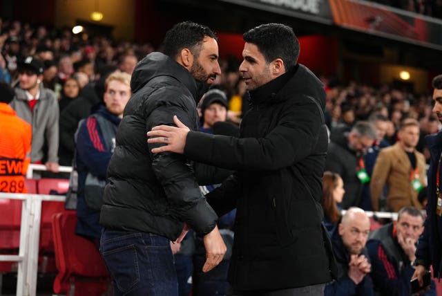 Ruben Amorim, left, and Mikel Arteta shake hands