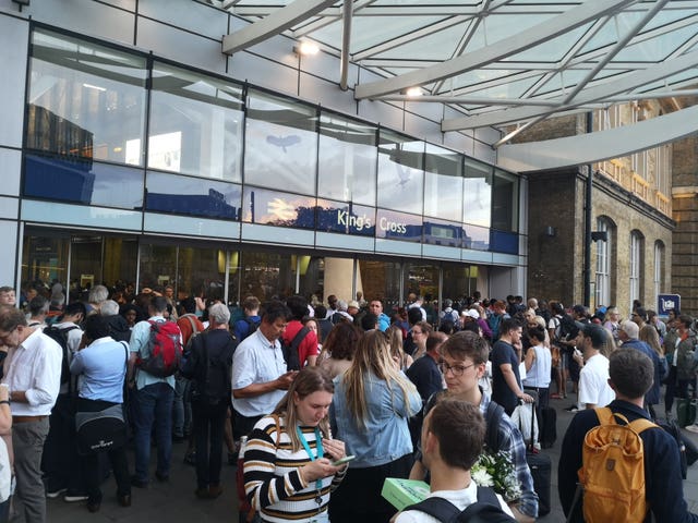 Passengers wait for news at King's Cross