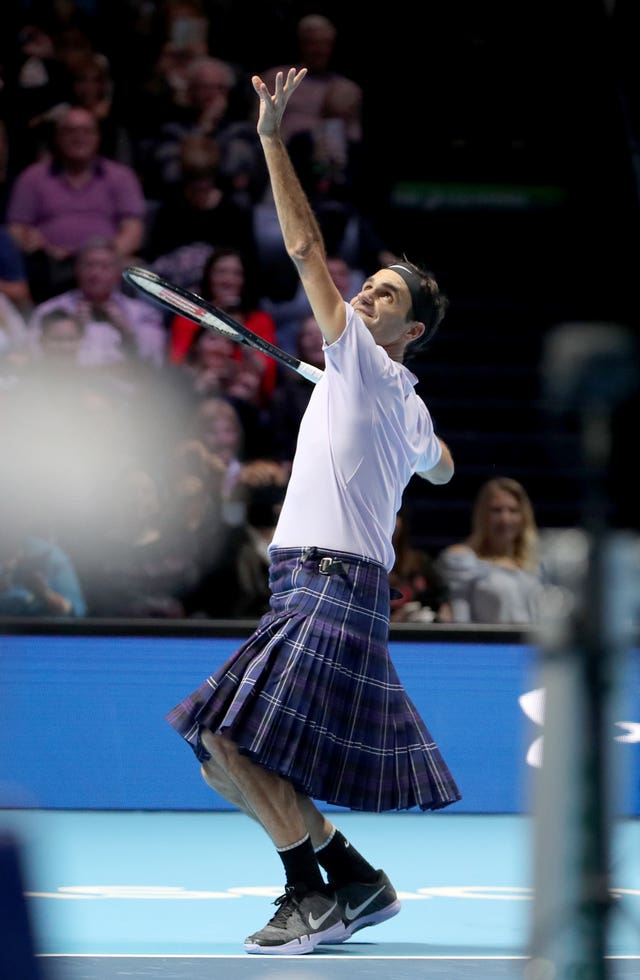 Roger Federer dons a kilt during Andy Murray's charity match in Glasgow