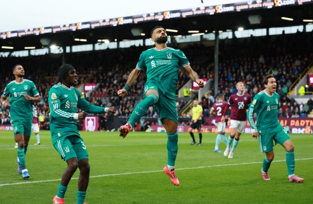 Liverpool’s Mohamed Salah celebrates his late winner