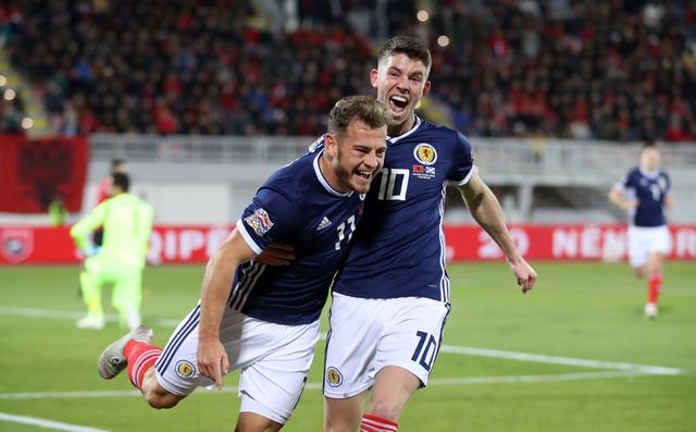 Ryan Fraser (left) opened the scoring in Scotland's 4-0 win in Albania which kept their Nations League promotion hopes alive 