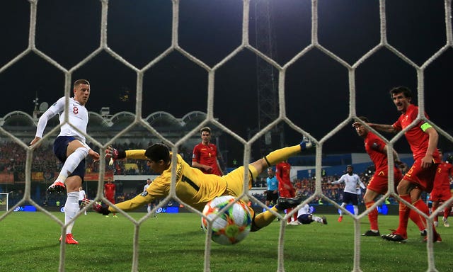 Ross Barkley turns in Callum Hudson-Odoi's shot to make it 2-1 to England in Montenegro