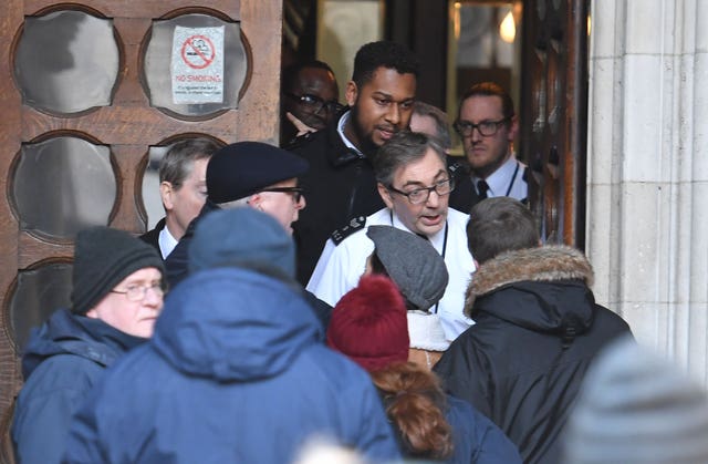 Some protesters were held back by security as they attempted to enter the Royal Courts of Justice (John Stillwell/PA)