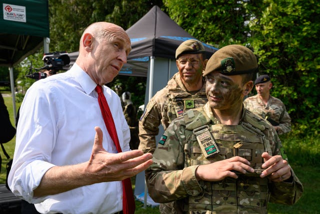 John Healey speaking to soldiers