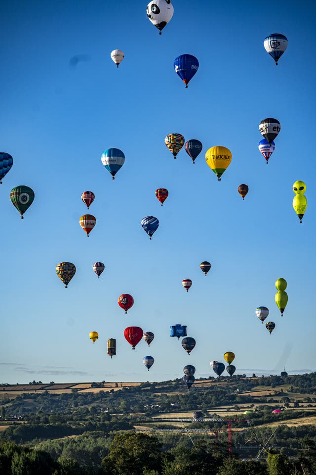 Hot air balloons in the sky in a mass ascent