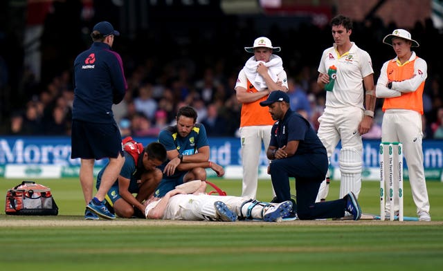 Australia's Steve Smith fell to the floor after a 92.4mph delivery from Jofra Archer struck him on the top of the neck