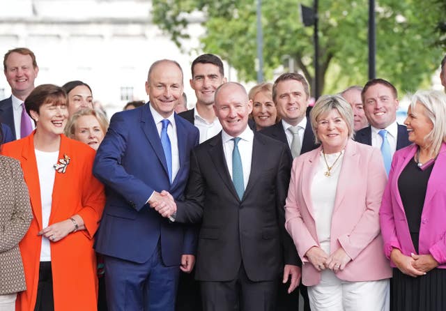 Taoiseach Micheal Martin, centre left, with Jim Gavin, centre right