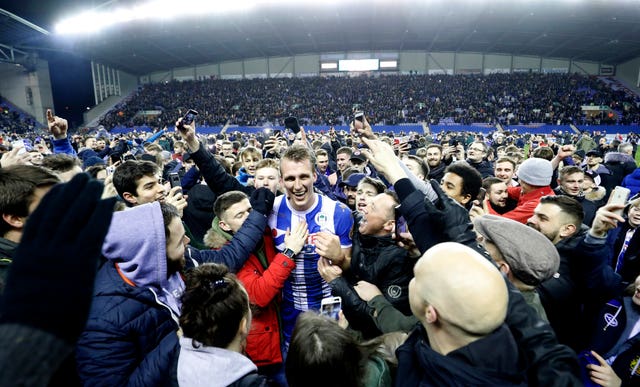 Dan Burn is mobbed by fans after the 1-0 win (Martin Rickett/PA)