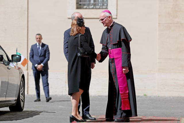Prefect of the Papal Household Petar Rajic welcomes Taoiseach Micheal Martin and his wife Mary O’Shea in San Damasso Courtyard, Vatican City
