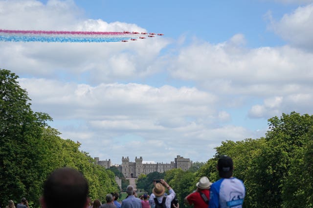 The Red Arrows fly over Windsor Castle to mark the Queen's official birthday 