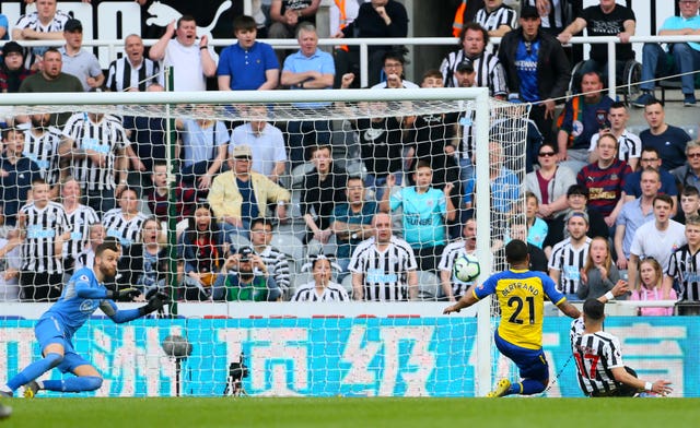 Ayoze Perez slides in to score his second