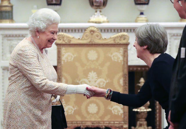 The Queen greets Prime Minister Theresa May (Jonathan Brady/PA)