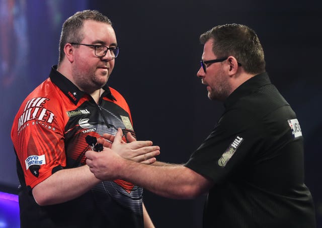 Stephen Bunting, left, had the last laugh after James Wade's nine-dart finish (Kieran Cleeves/PA)