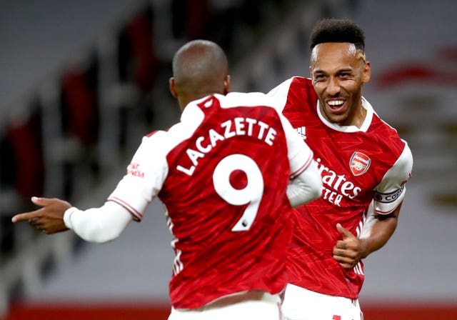 Lacazette, left, headed home Pierre-Emerick Aubameyang's cross