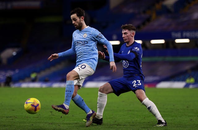 Bernardo Silva shields the ball from Billy Gilmour 