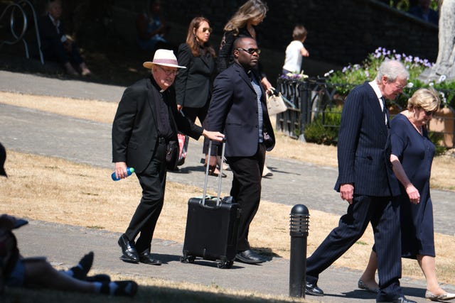Mourners arriving for the funeral of former Tory minister Ann Widdecombe at Buckfast Abbey
