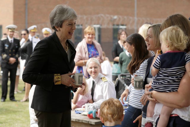 Theresa May meets armed forces personnel and their families at the Permanent Joint Headquarters and Nato’s maritime headquarters in Northwood
