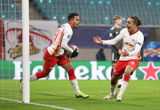 RB Leipzig's Justin Kluivert celebrates scoring his side's third goal against Manchester United