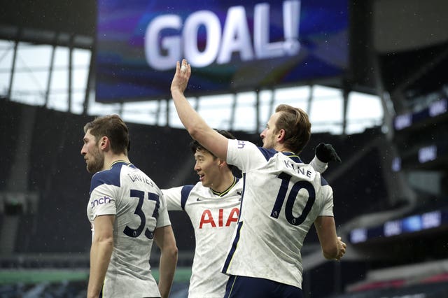 Harry Kane, right, celebrates scoring Tottenham's first goal