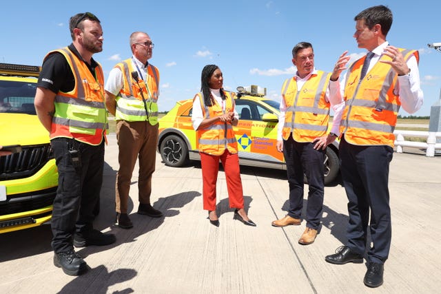 Conservative Party leader Kemi Badenoch meeting staff during a visit to Stansted Airport. (Chris Radburn/ PA)