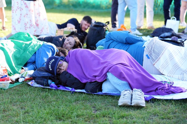 Spectators in the queue on day one of the 2026 Wimbledon Championships at the All England Lawn Tennis and Croquet Club, London