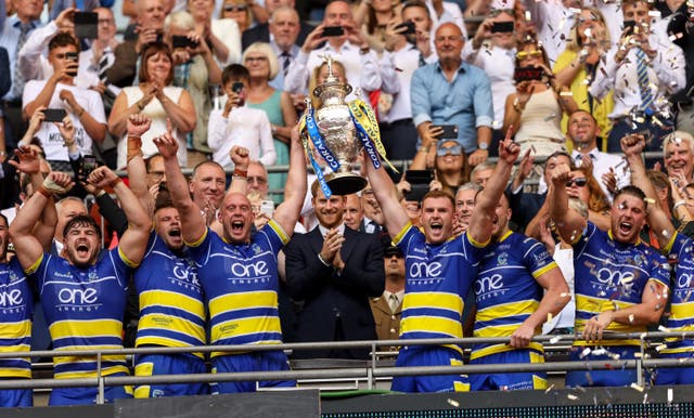 Warrington lift the Challenge Cup trophy after their victory against St Helens at Wembley