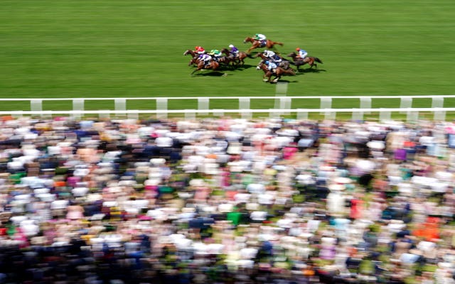 The Ridler and Paul Hanagan (left, in red) coming home to win the Norfolk