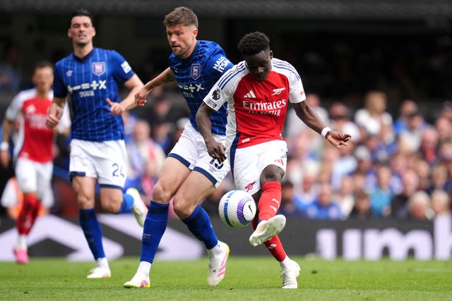 Arsenal’s Bukayo Saka, right, in action during the Premier League match at Portman Road