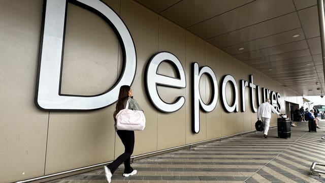 Passengers at Belfast International Airport, Co Antrim, following disruption to flights due to a 'technical issue' at an air traffic control centre in Scotland, National Air Traffic Services (Nats) have said
