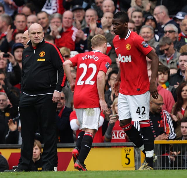 Scholes and Pogba (right) spent a short time as team-mates at Old Trafford.