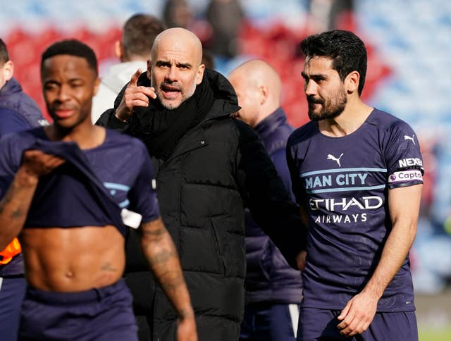 Manchester City manager Pep Guardiola with Ilkay Gundogan