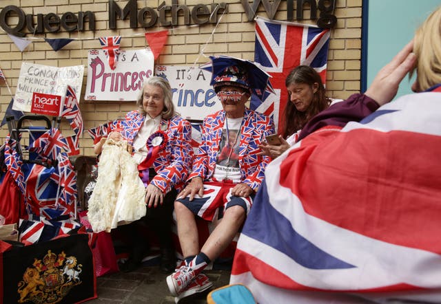 Royal fans Margaret Tyler and Terry Hutt waiting outside the hospital for the birth of Princess Charlotte in 2015 (Yui Mok/PA)