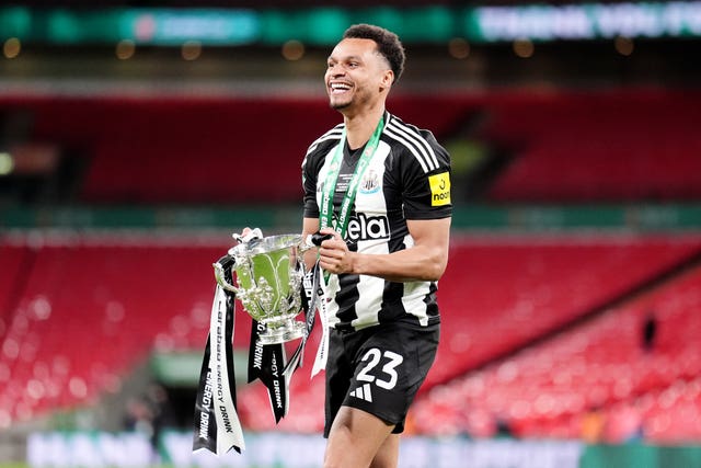 Newcastle United’s Jacob Murphy celebrates with the trophy after winning the Carabao Cup final at Wembley