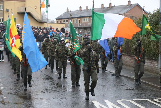 A Republican colour party during their Easter Commemoration parade in the Creggan area of Derry (Niall Carson/PA)