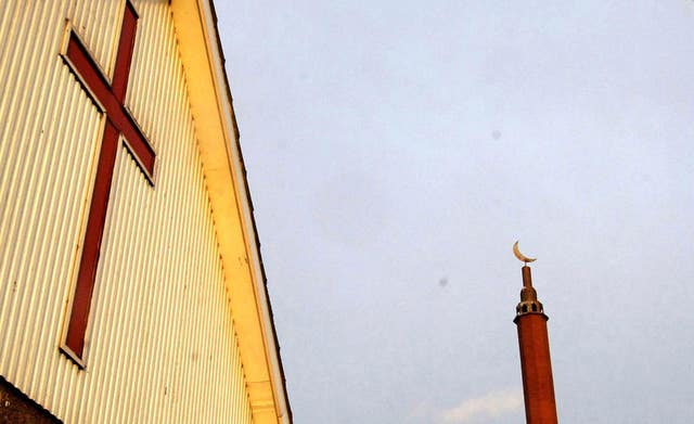 A mosque and church stand side by side in Doncaster (PA)