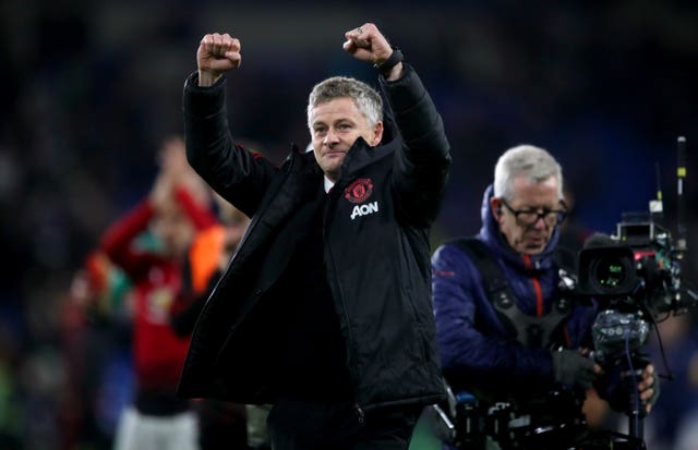Ole Gunnar Solskjaer celebrates an opening win over Cardiff