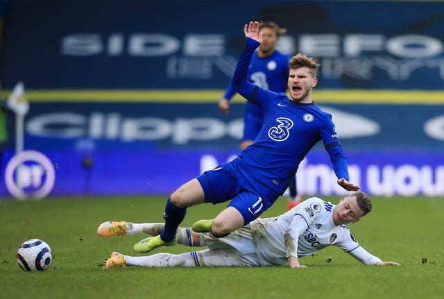 Ezgjan Alioski challenges Timo Werner 